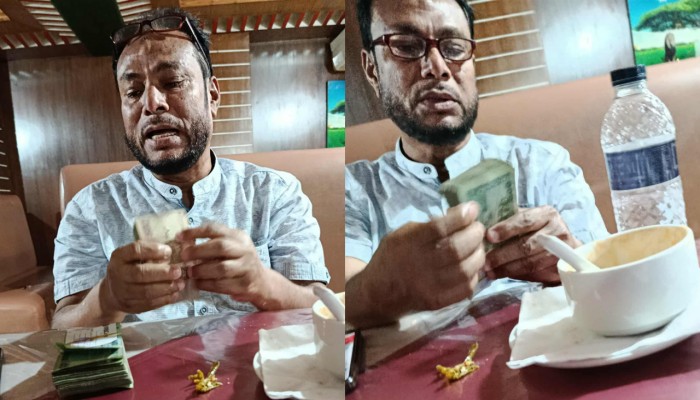 রেস্টুরেন্টে টাকা গণনার ছবি ভাইরাল, বিতর্কে পৌর প্রকৌশলী